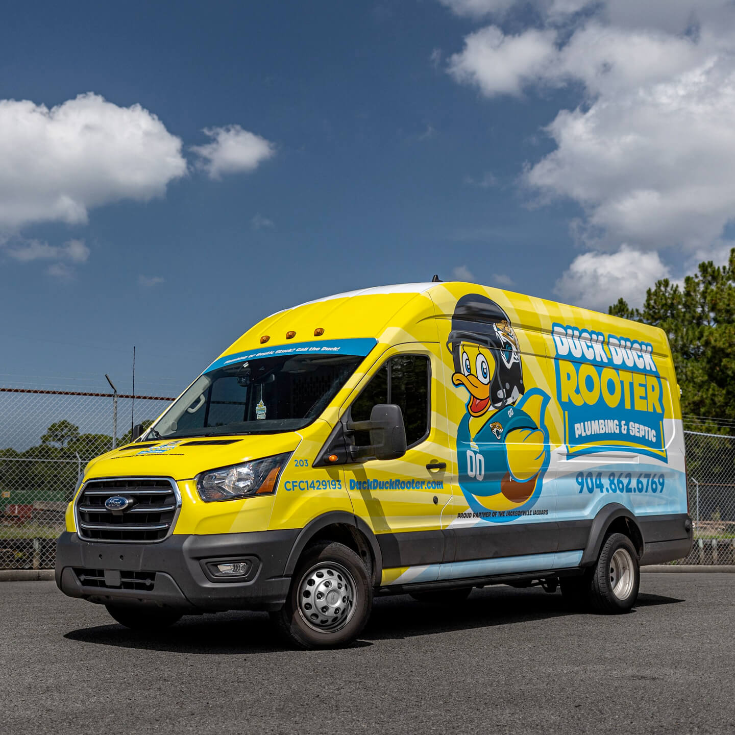 Cargo Van wrapped in local business graphics.
